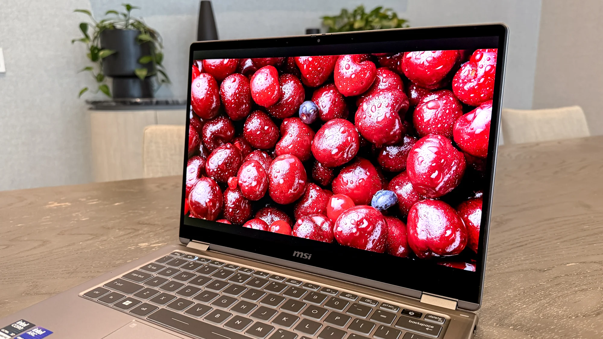 MSI Prestige 14 Flip AI+ on a table